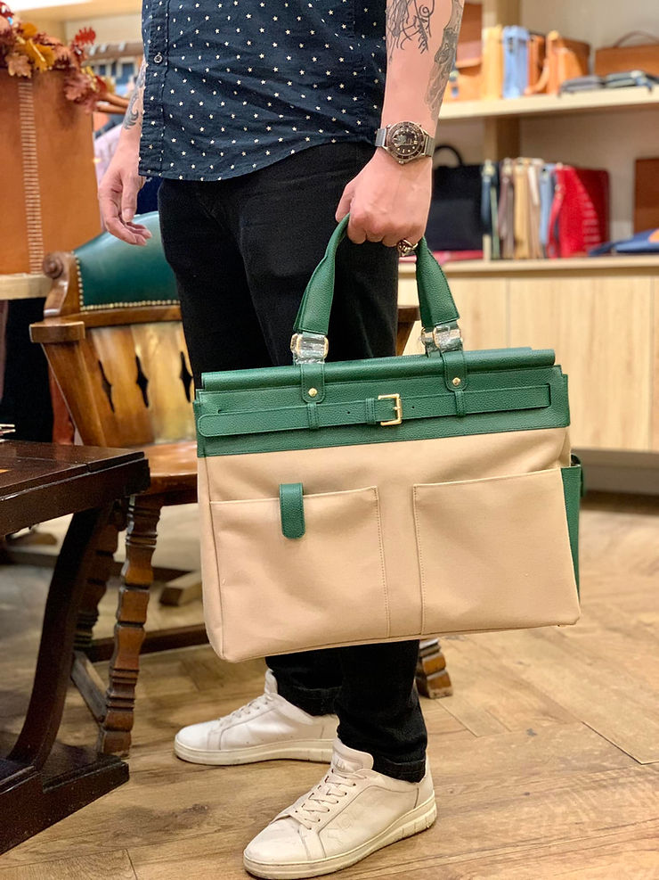 HE CARES ABOUT THE DETAILS & HE REALLY LOVES THIS BAG.